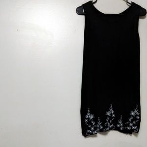 Dramatic black tank with floral stitch